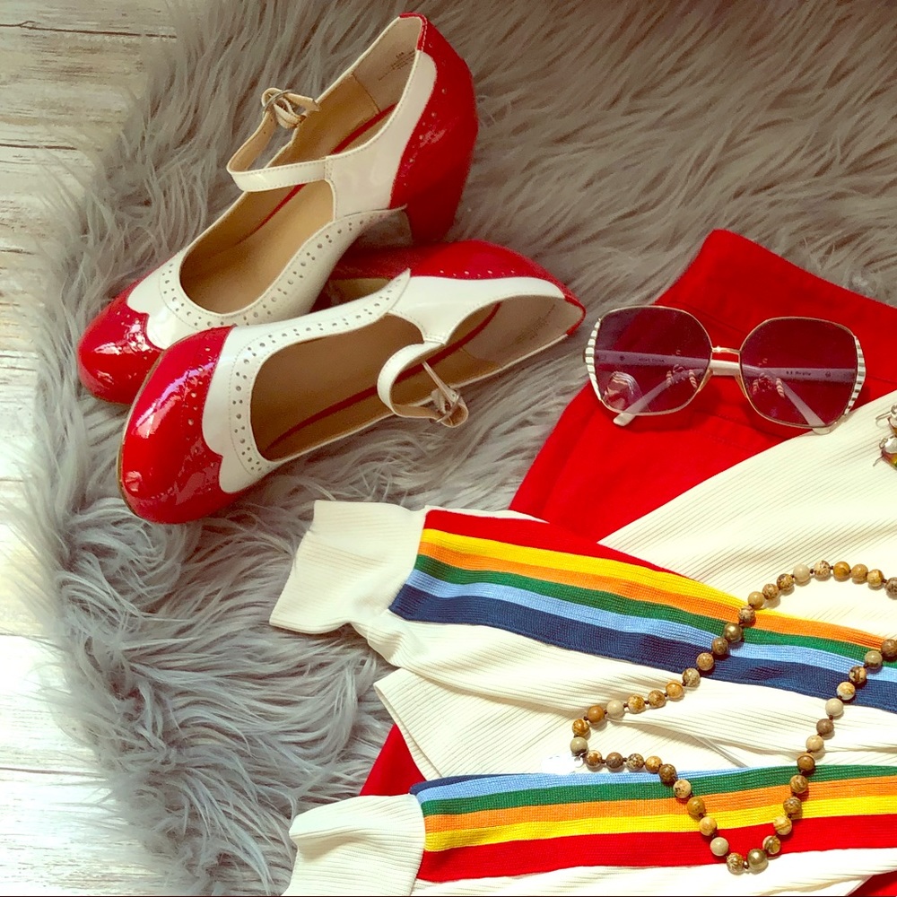 Red and white heeled saddle shoes, size 8